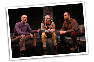 The three men (James Michaeal Reilly, Pete Pryor, and Stephen Patrick Martin) share a moment of peace over olives. Photo: John R. Schoonover.